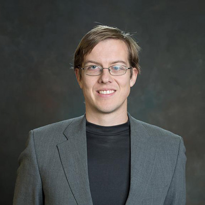 headshot of benjamin peters