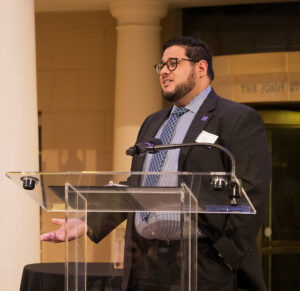 Person speaking at lectern