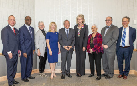 Photograph of Erwin Chemerinsky with TU faculty and staff