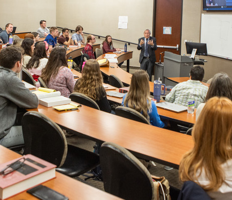 Photograph of Erwin Chemerinsky presenting a lecture to TU students