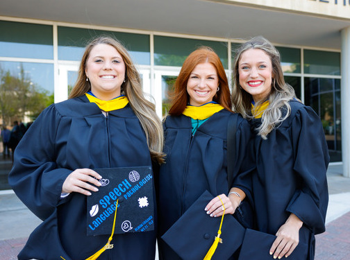 Photo of UTulsa speech language pathology graduate students at commencement