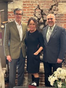 Carrie Kirk smiling and standing next to the Dean of ECS
