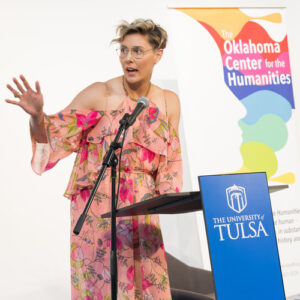 Photograph of a speaker at an OCH event