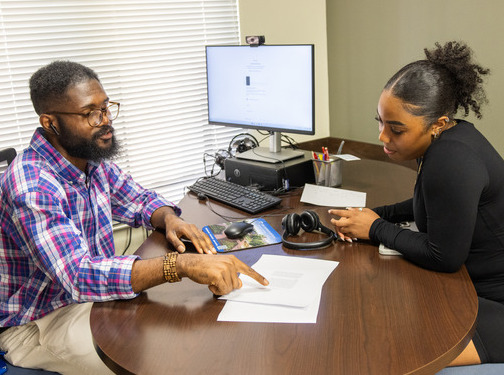student with advisor