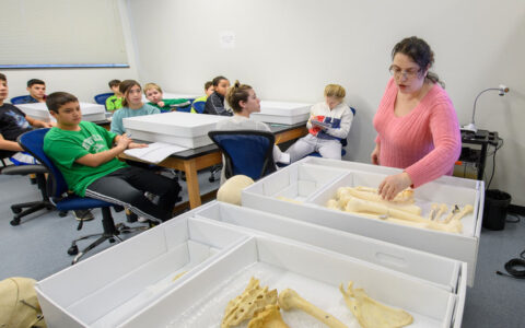 Belmaker (right) works with highschool, undergraduate, and graduate students in her research.