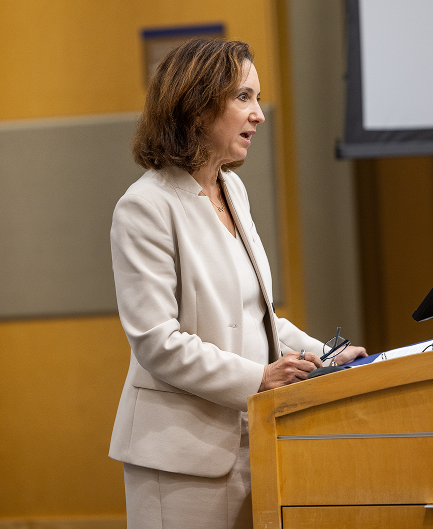 Woman giving Dorwart Lecture on reproductive justice at podium.