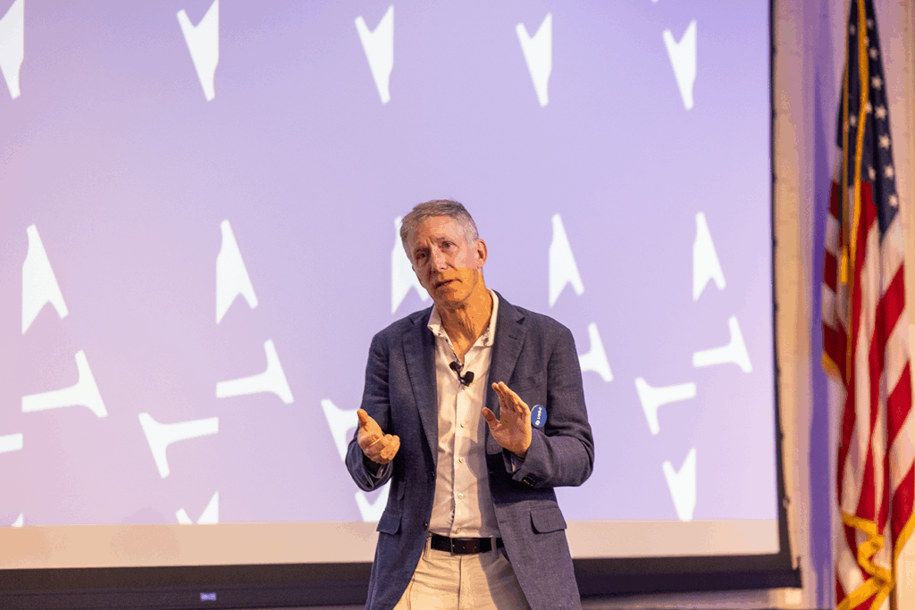 Greg Kidd speaking at Friends of Finance event, exploring the future of money.