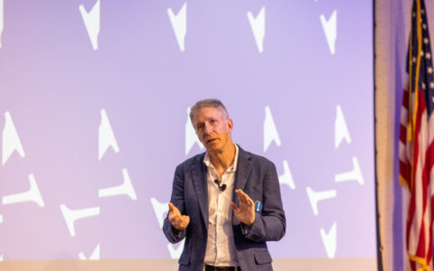 Greg Kidd speaking at Friends of Finance event, exploring the future of money.