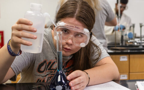 UTulsa student Andrea Taylor working in a lab