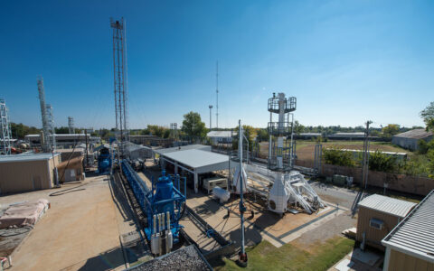 McDougall School of Petroleum Engineering's research facility with towers and equipment.