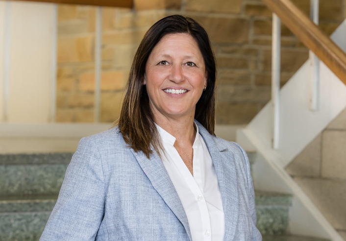 Samantha Beams, Oxley Associate Dean, smiles in a professional portrait.