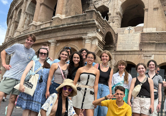Jumpstart UTulsa students pose in front of the Colosseum in Rome.