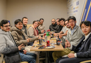 UTulsa welcomes international students at orientation, enjoying food and global engagement.