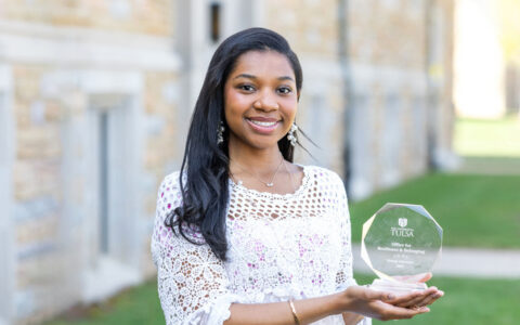 Thunder Fellow holding the Office for Resilience & Belonging award. Building leadership.