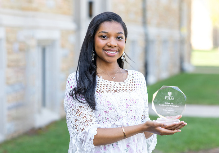 Thunder Fellow holding the Office for Resilience & Belonging award. Building leadership.