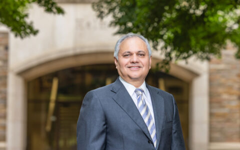 Dean standing in front of building. AI and Our Jobs.