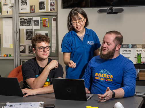 Students collaborating on laptops during a study session