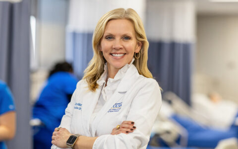 Dean Sara Abbott in a nursing simulation lab at Oxley College of Health & Natural Sciences