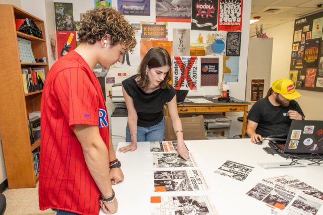 Students review design projects at Third Floor Design.