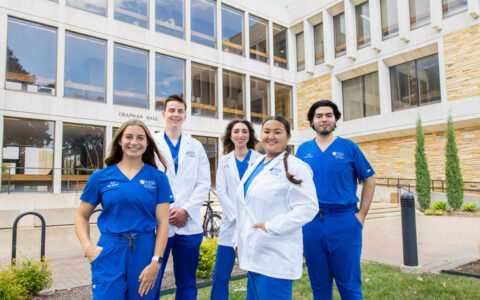 UTulsa DNP students in front of Chapman Hall