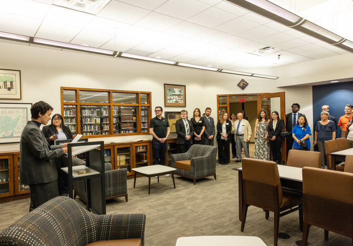People gather in the Native American law reading room.