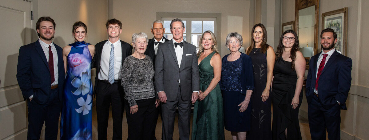 College of Law group photo: distinguished award recipients accompanied by law students at the Law Gala ceremony.