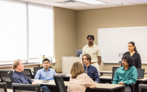 Students present BIS capstone technology solutions to Tulsa nonprofits.