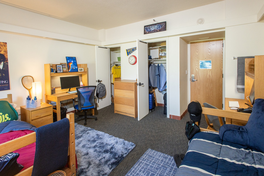 John Mabee Hall dorm room with beds, desks, and closet.