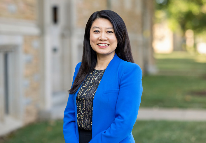 Vivian Wang, Vice Provost and Fulbright U.S. Scholar Award recipient, smiles outdoors.