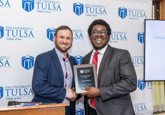 Tulsa Law awards ceremony: Ashan Robinson receives award from faculty