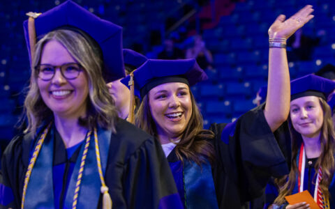 Law graduates in caps and gowns at commencement 2026.