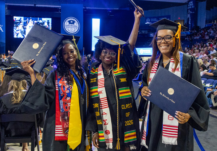 UTulsa Class of 2026 graduates celebrate commencement with diplomas.