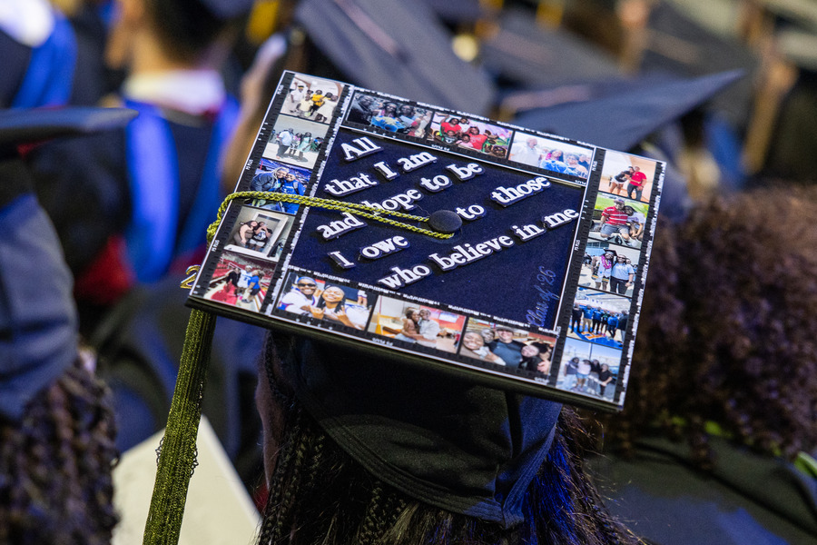 Graduation cap with photos and quote: "All that I am and hope to be is those who believe in me.