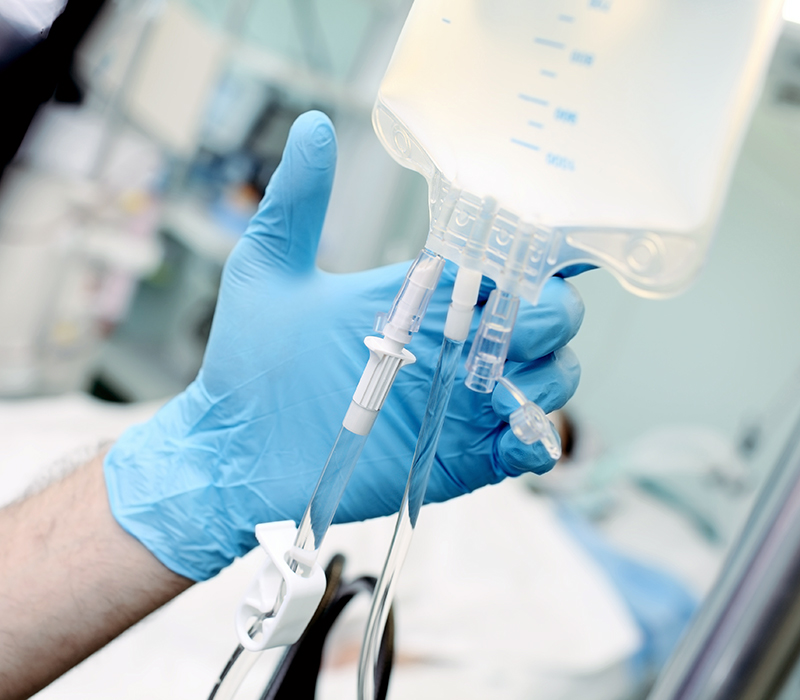 Nurse preparing IV drip
