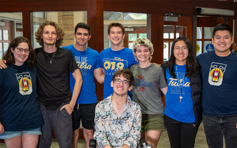 ClearSay AI team, including a person in a wheelchair, at the University of Tulsa.