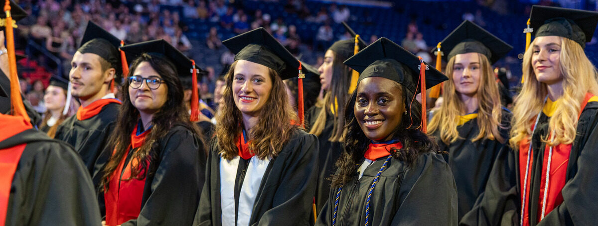 Graduates in regalia at UTulsa commencement ceremony