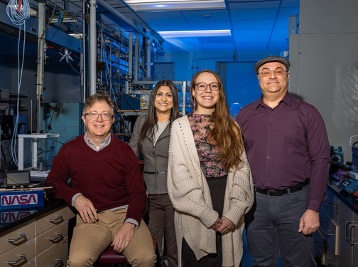 UTulsa faculty and student researchers in a campus lab