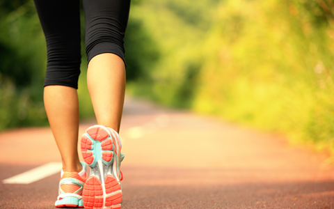 Woman walking on a path