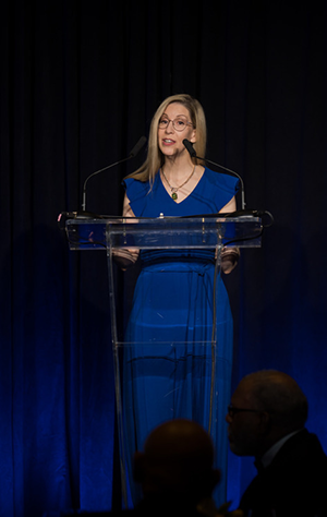 Ann Keele (J.D. '06) speaks at podium