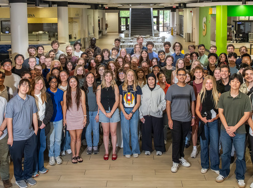 Group of students pose for photo the student union.