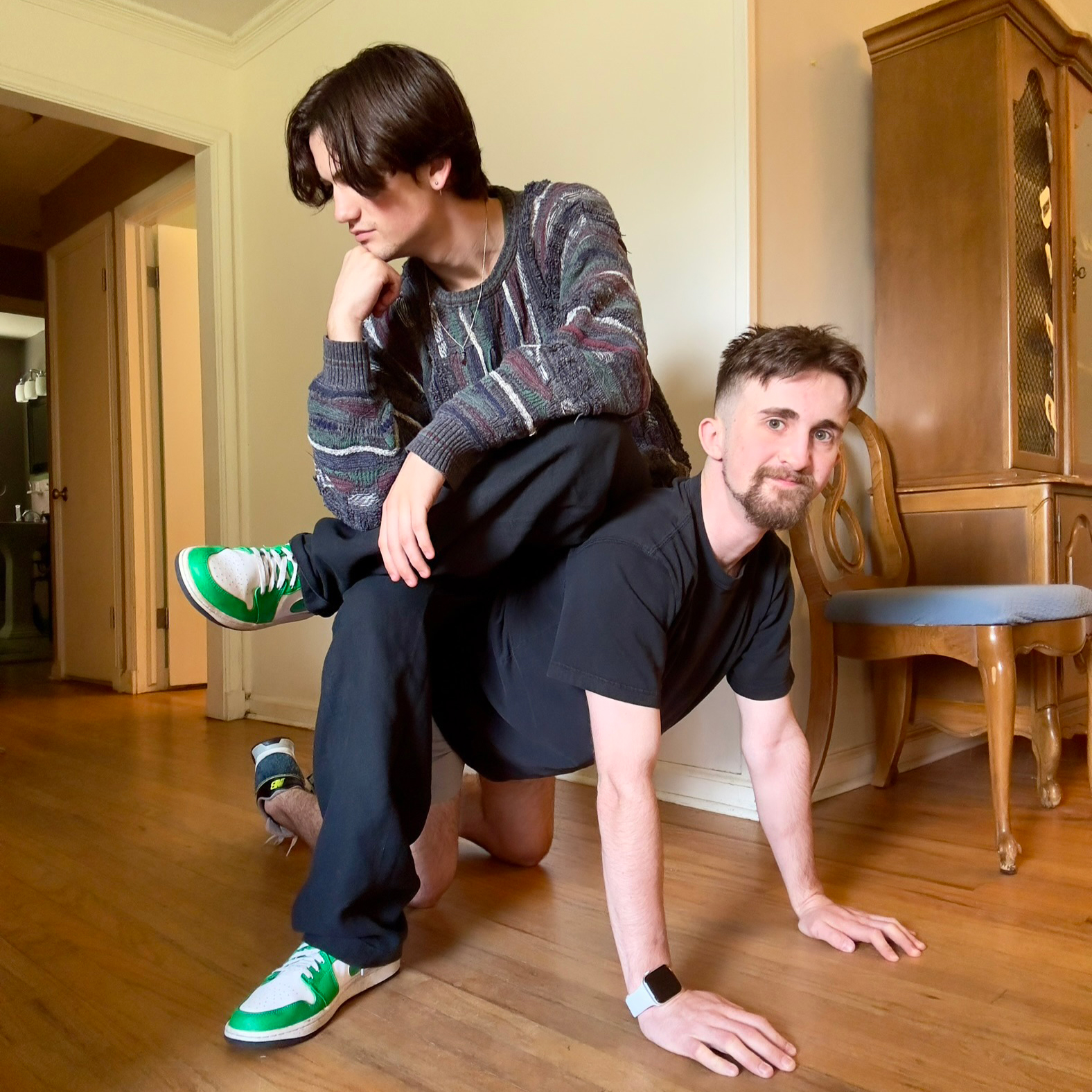 Two young men on the floor
