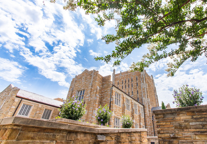 UTulsa building with lush greenery