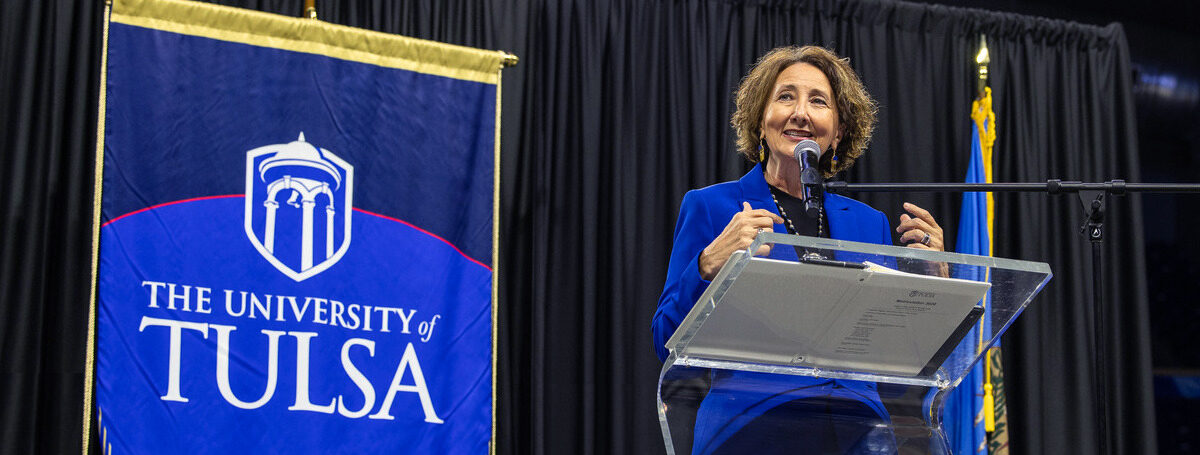 University of Tulsa President Stacy Leeds speaking at podium