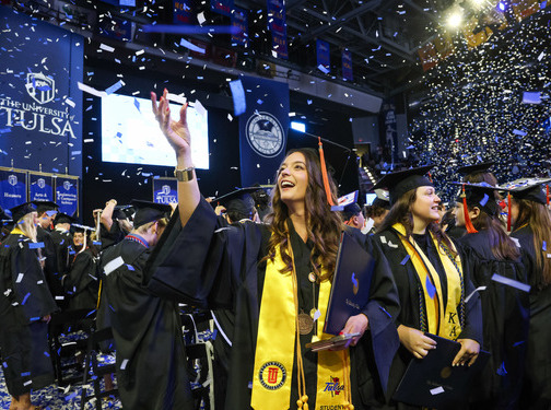 UTulsa graduates celebrating with confetti
