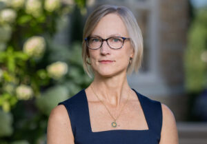 Professor with glasses and necklace