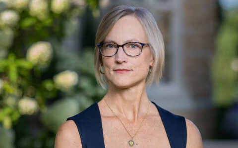 Professor with glasses and necklace