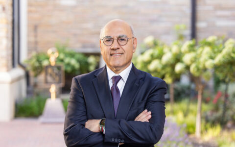Hazem Refai in suit with arms crossed