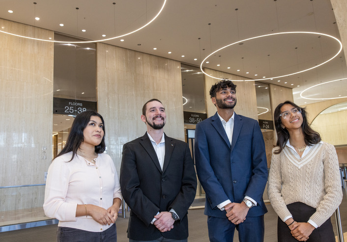 Four students in business attire