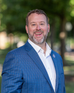 Dean Oxley in blue suit