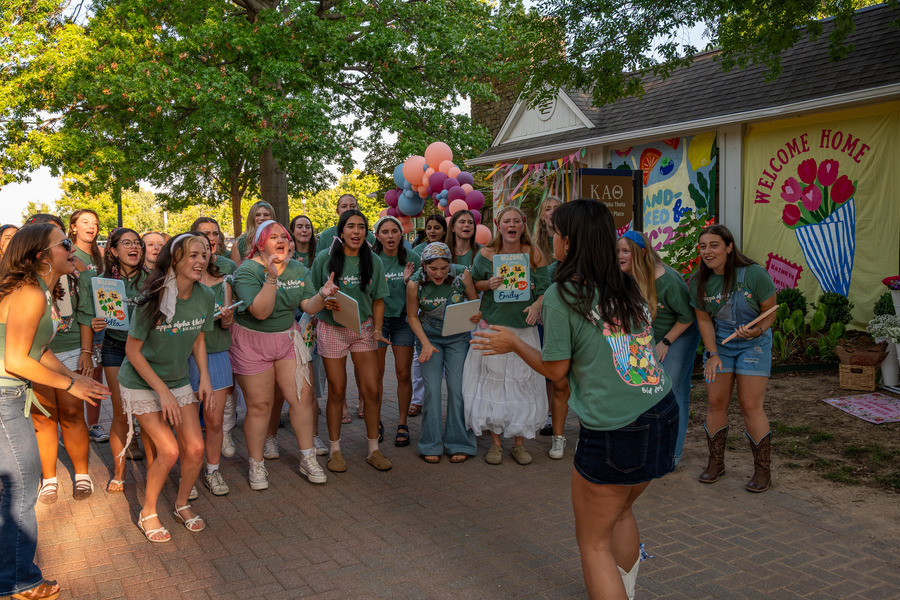 Kappa Alpha Theta sorority celebrates Bid Day in green shirts